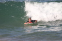 Burblechaz on Bodyboard catching a wave